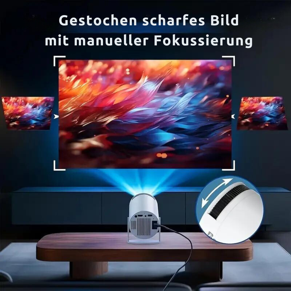 Mini Beamer LED auf einem Lowboard, Detail des Fokusrads
