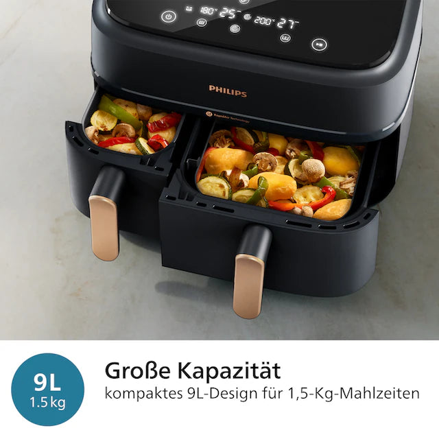 Philips Dual Basket Airfryer mit geöffneten Körben und gleichzeitiger Zubereitung von Gemüse und Snacks