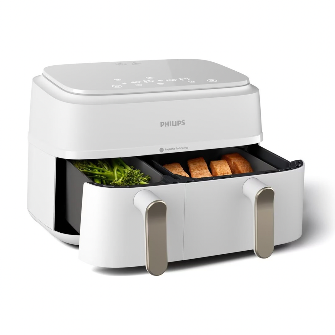 Philips Heissluft-Fritteuse Dual Basket in Champagner mit herausgezogenen Körben aus Perspektivansicht