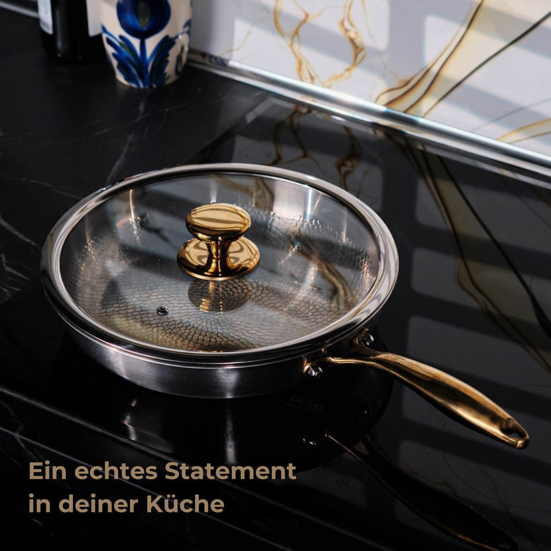 Poêle Titanium Pro, Titan Gold Edition, avec couvercle en verre sur la plaque de cuisson