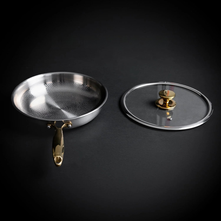 Poêle Titanium Pro, Titan Gold Edition, poêle et couvercle en verre côte à côte